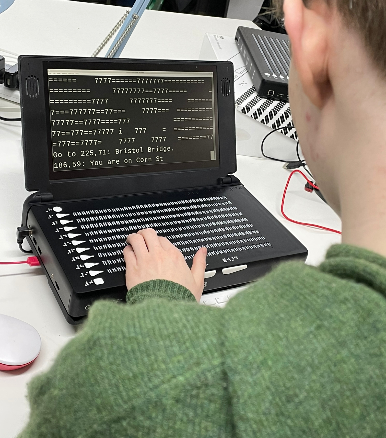 A 16 year old Canute Console pilot participant using a Console in January to develop and test a spacial application that works both graphically and in Braille